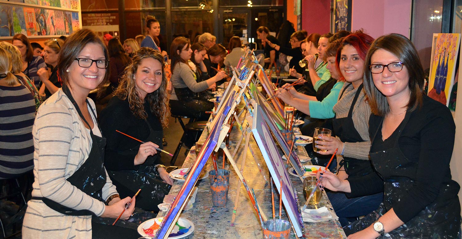 a group of women at the Paint & Sip Studio!